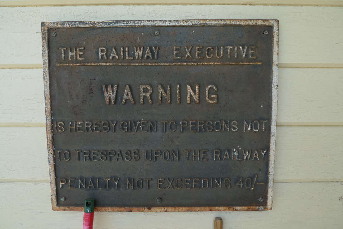 Vintage signage at Spey Bay station