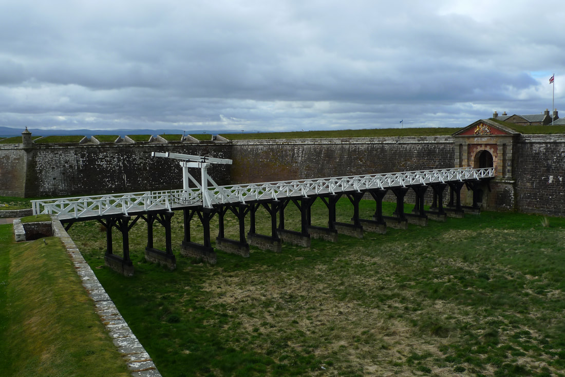 Bridge that features a drawbridge taking you further into the Fort George complex
