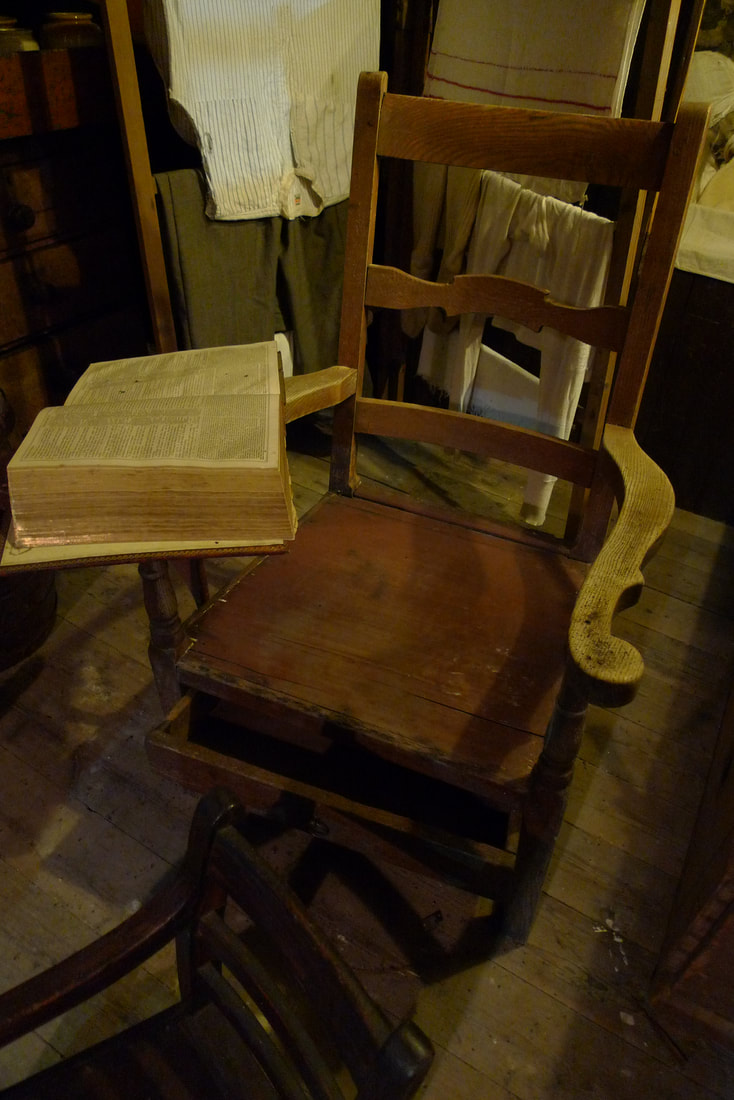 Scottish Bible chair with an armrest for the bible and a drawer underneath to store the bible.