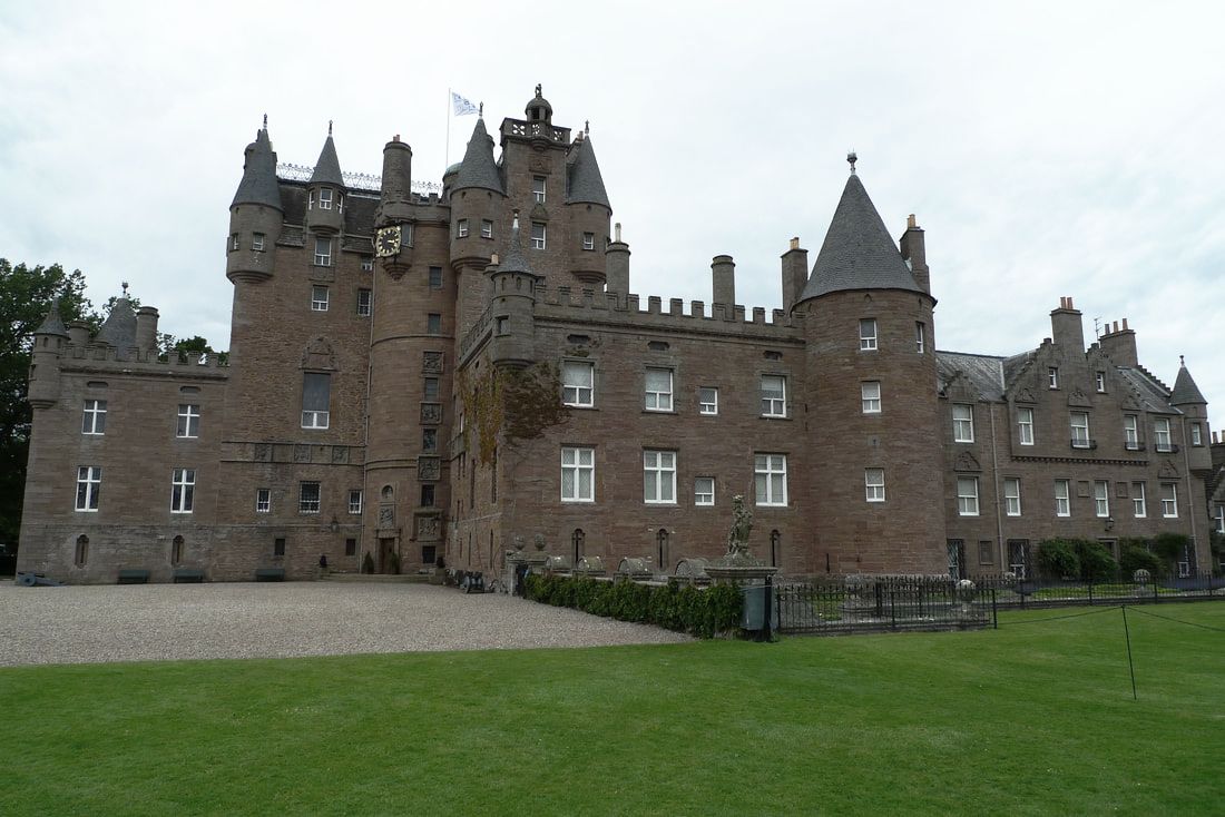 Glamis Castle. There are a lot of turrets and windows on the castle
