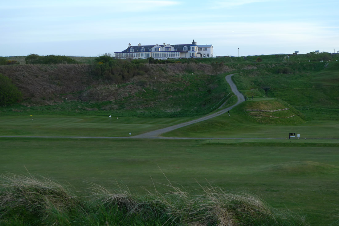 Cullen Bay Hotel with the golf course in the foreground