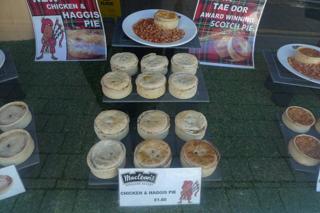 Window display of pies at Macleans bakery in Forres