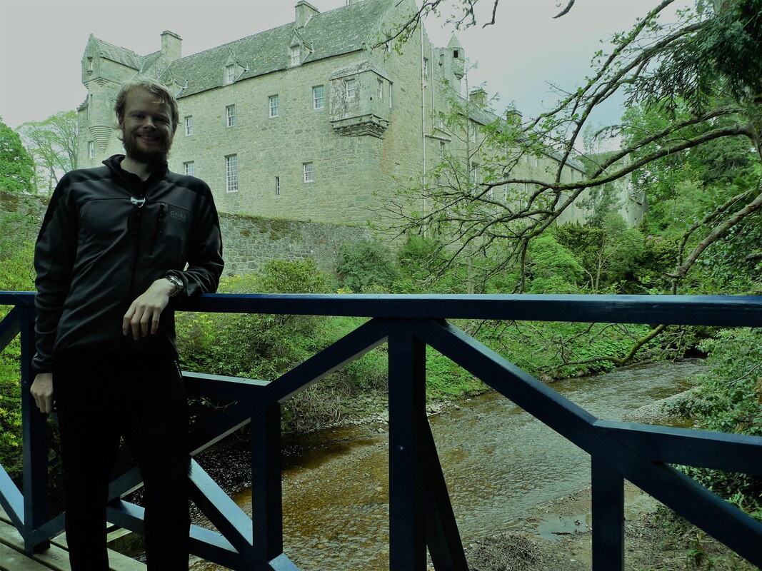 Author on the blue bridge at Cawdor Castle