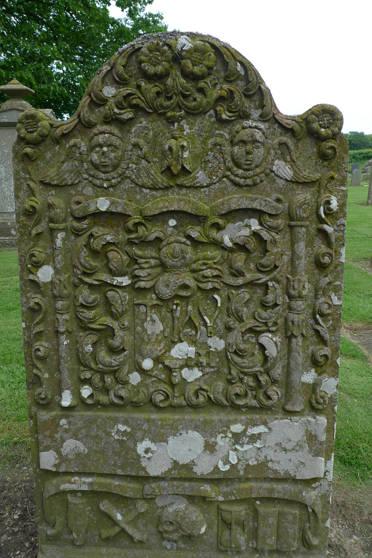 A beautifully carved headstone at Inverarity Parish Church
