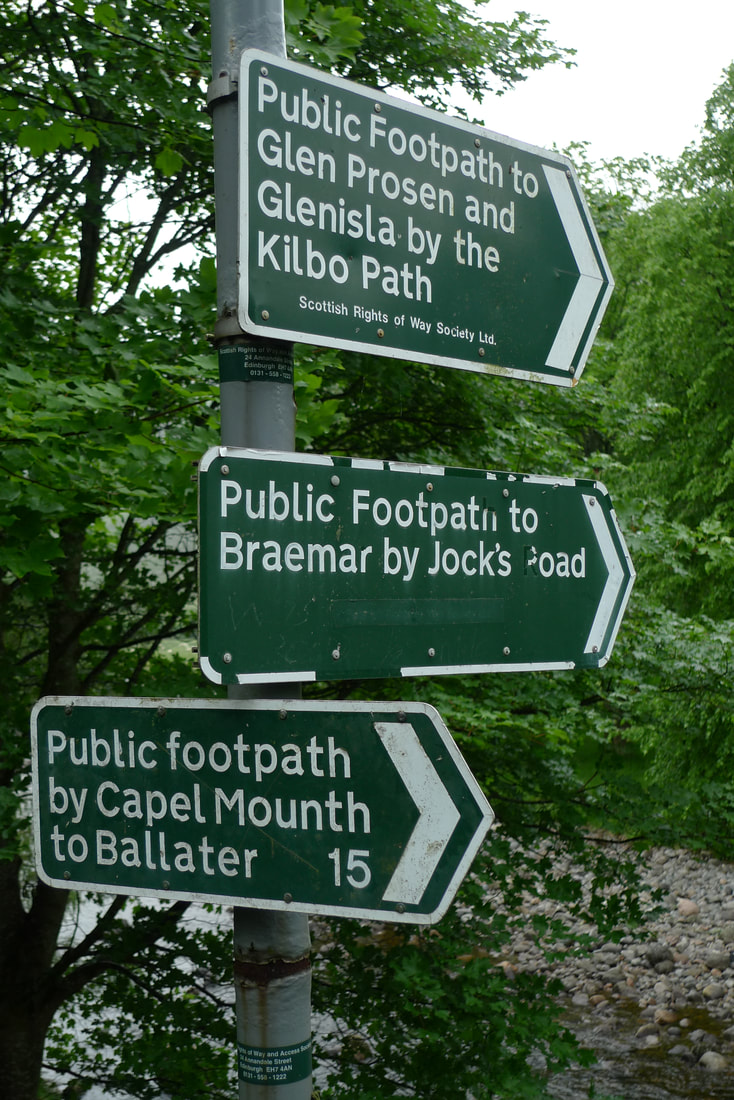 Signs in Glen Doll that say 'public footpath'