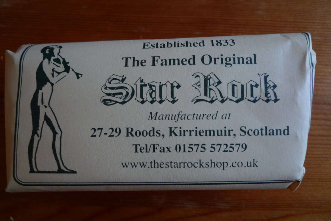 A packet of Star Rock with a design that features the Peter Pan statue